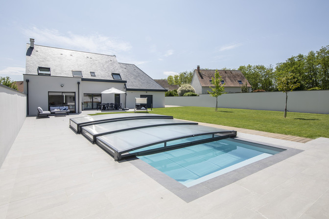 découvrez les avantages d'une piscine toit amovible : une solution esthétique et pratique qui vous permet de profiter de votre espace aquatique en toute saison. personnalisez votre piscine avec un toit amovible pour allier confort et design.